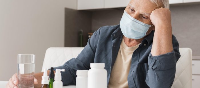 medium-shot-sick-man-wearing-medical-mask